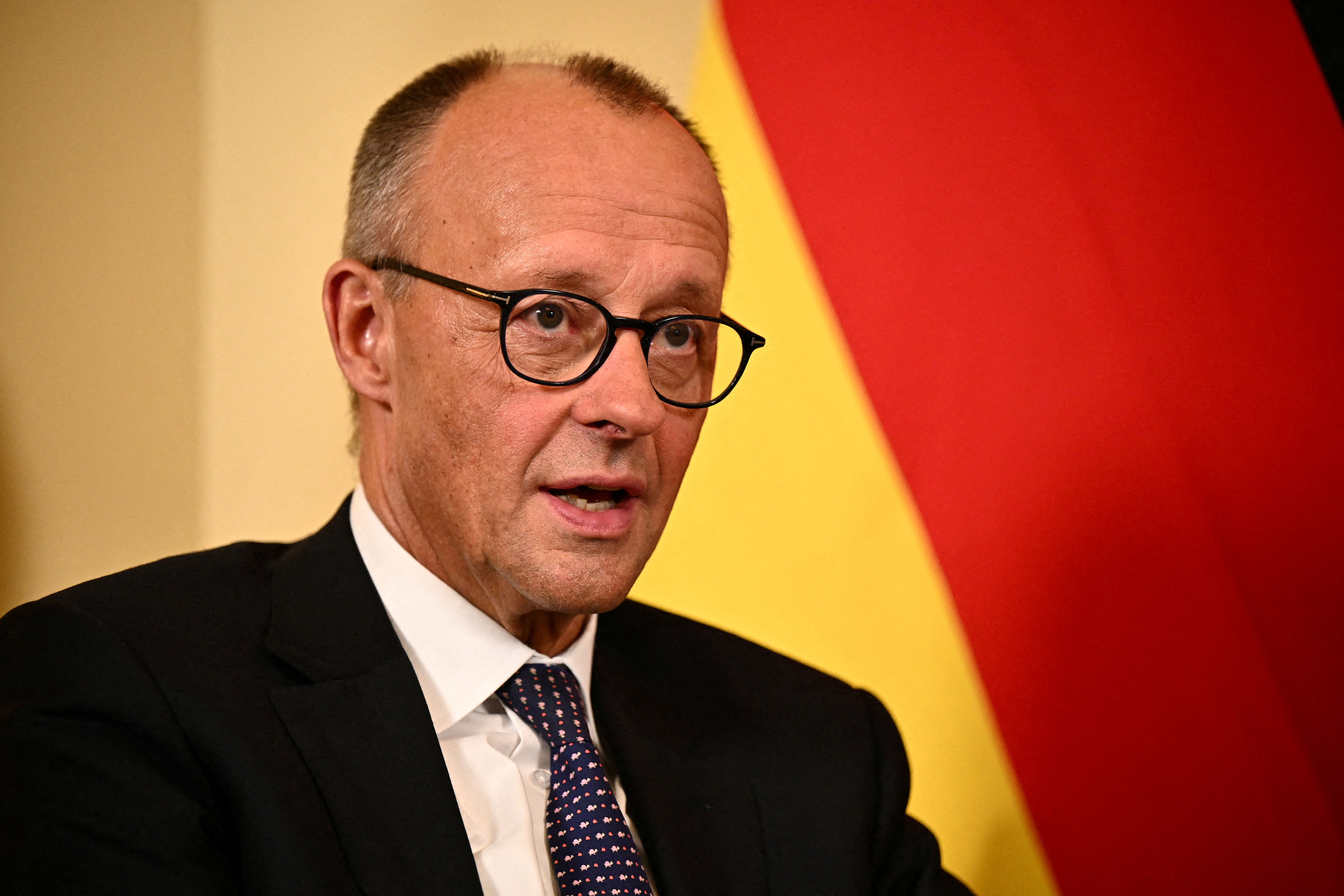 FILE PHOTO: German Chancellor Merz visits London