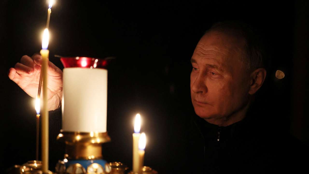 Russian President Putin lights a candle in memory of the victims of the Crocus City Hall attack, in Moscow Region