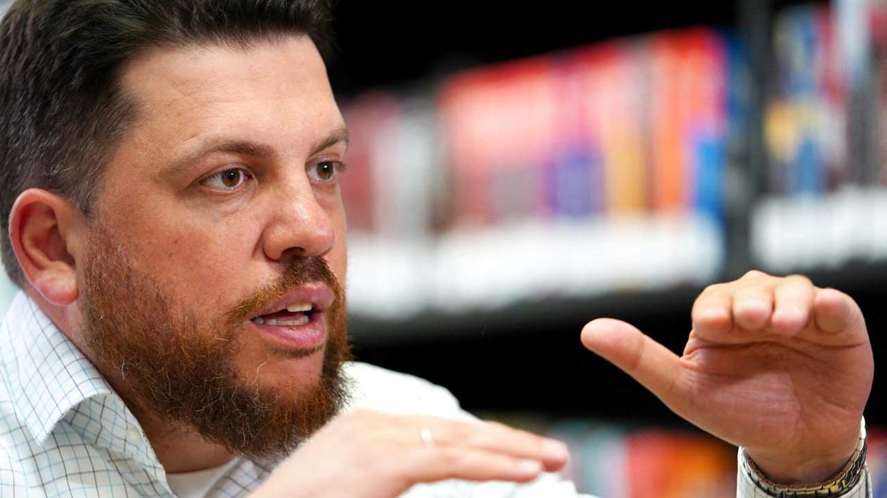FILE PHOTO: Leonid Volkov speaks during an interview in Vilnius