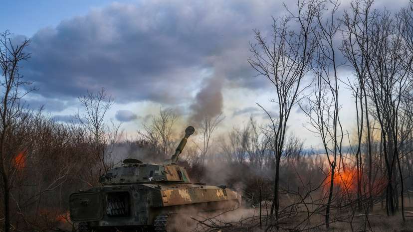 Ukrainian servicemen fires a self-propelled howitzer towards Russian troops in a front line in Kherson region