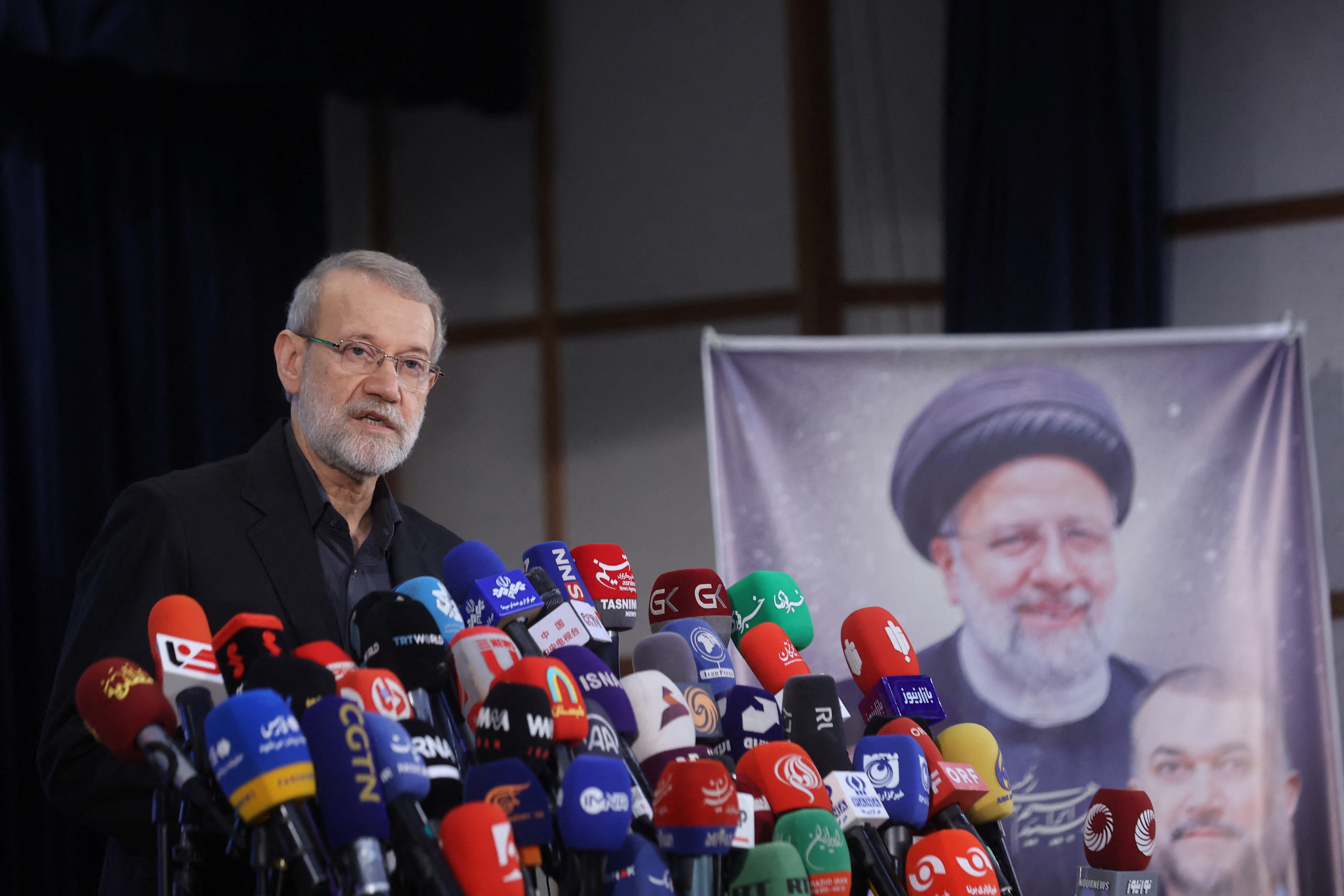Ali Larijani, former chairman of the parliament of Iran, speaks at a press conference after registering as a candidate for the presidential election at the Interior Ministry, in Tehran