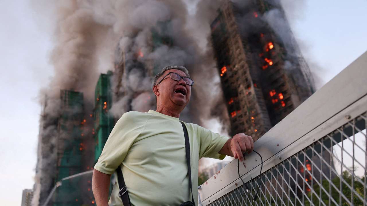 Flames engulf bamboo scaffolding across multiple buildings at Wang Fuk Court housing estate, in Tai Po