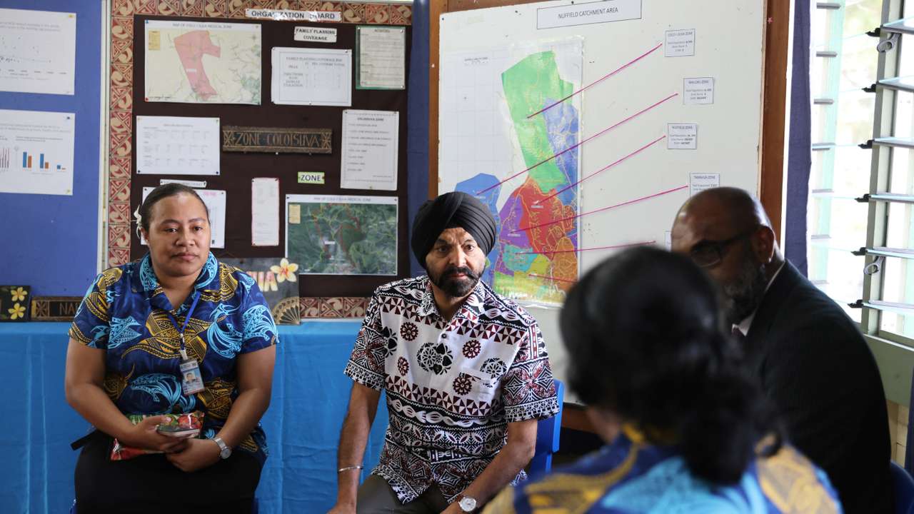 World Bank President Ajay Banga talks to health workers at the Nuffield Health Center in Suva