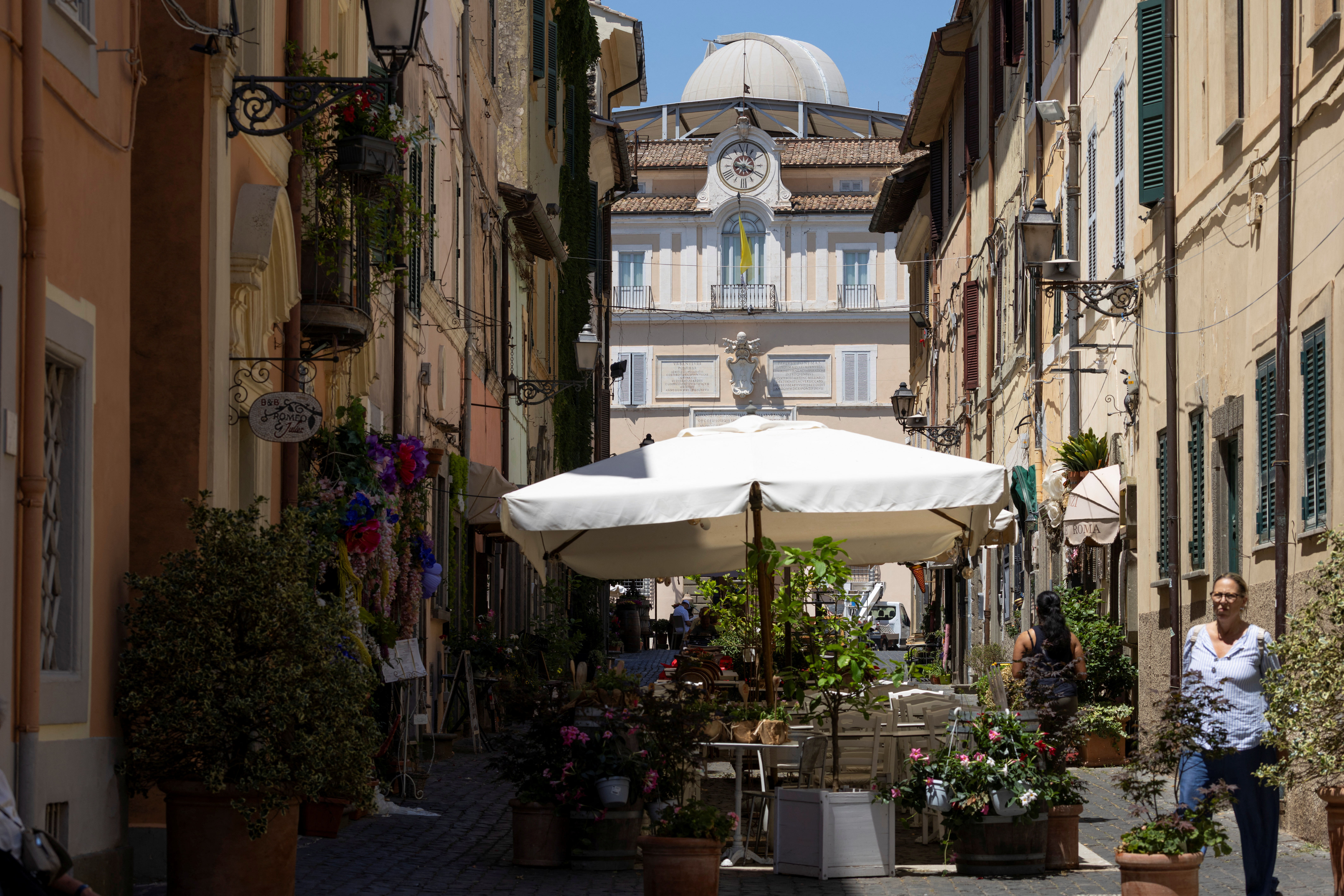 Town hosting Pope Leo's holiday happy to see him, and his tourists