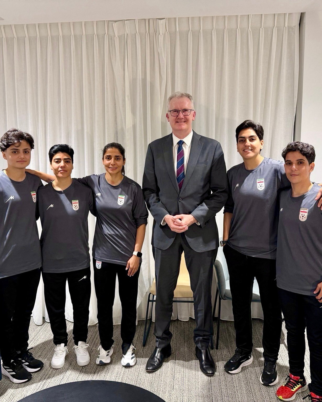 Australia's Home Affairs Minister Tony Burke grants five women from the Iranian women's soccer team humanitarian visas