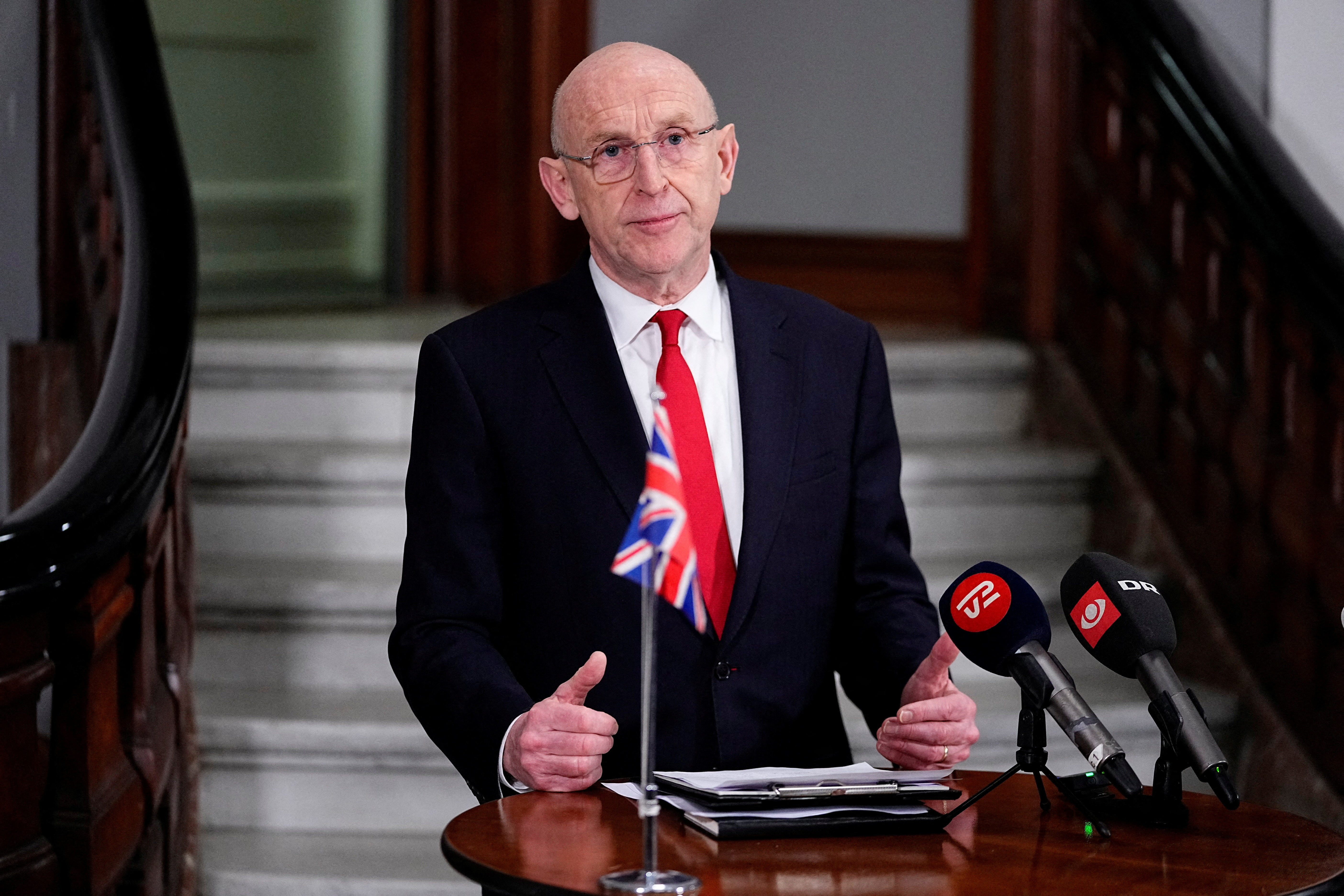 FILE PHOTO: Danish Defense Minister Poulsen and the British Defense Minister Healey attend a press conference at the Ministry of Defense in Copenhagen