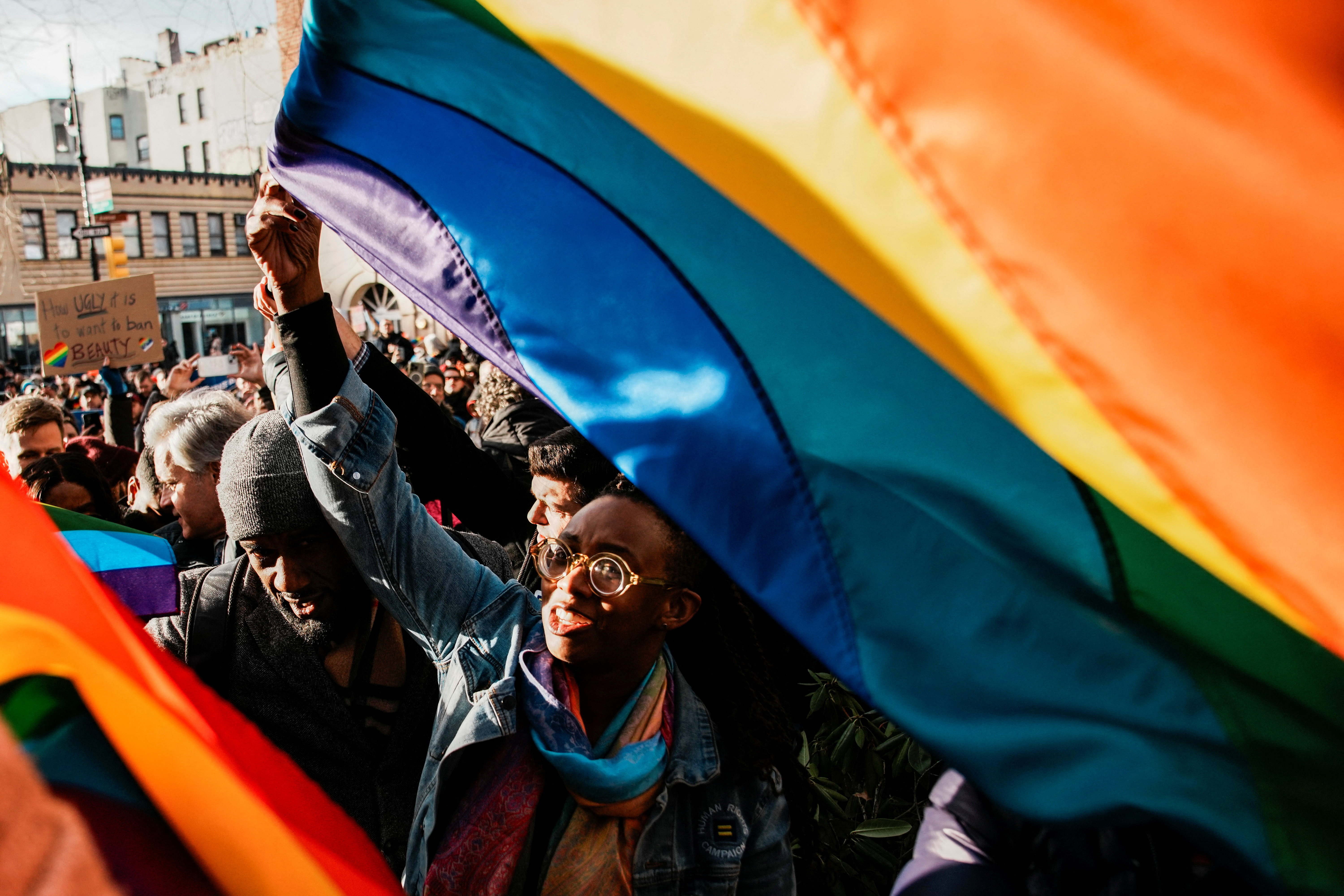 People gather at the Stonewall National Monument after authorities removed the Pride flag in New York