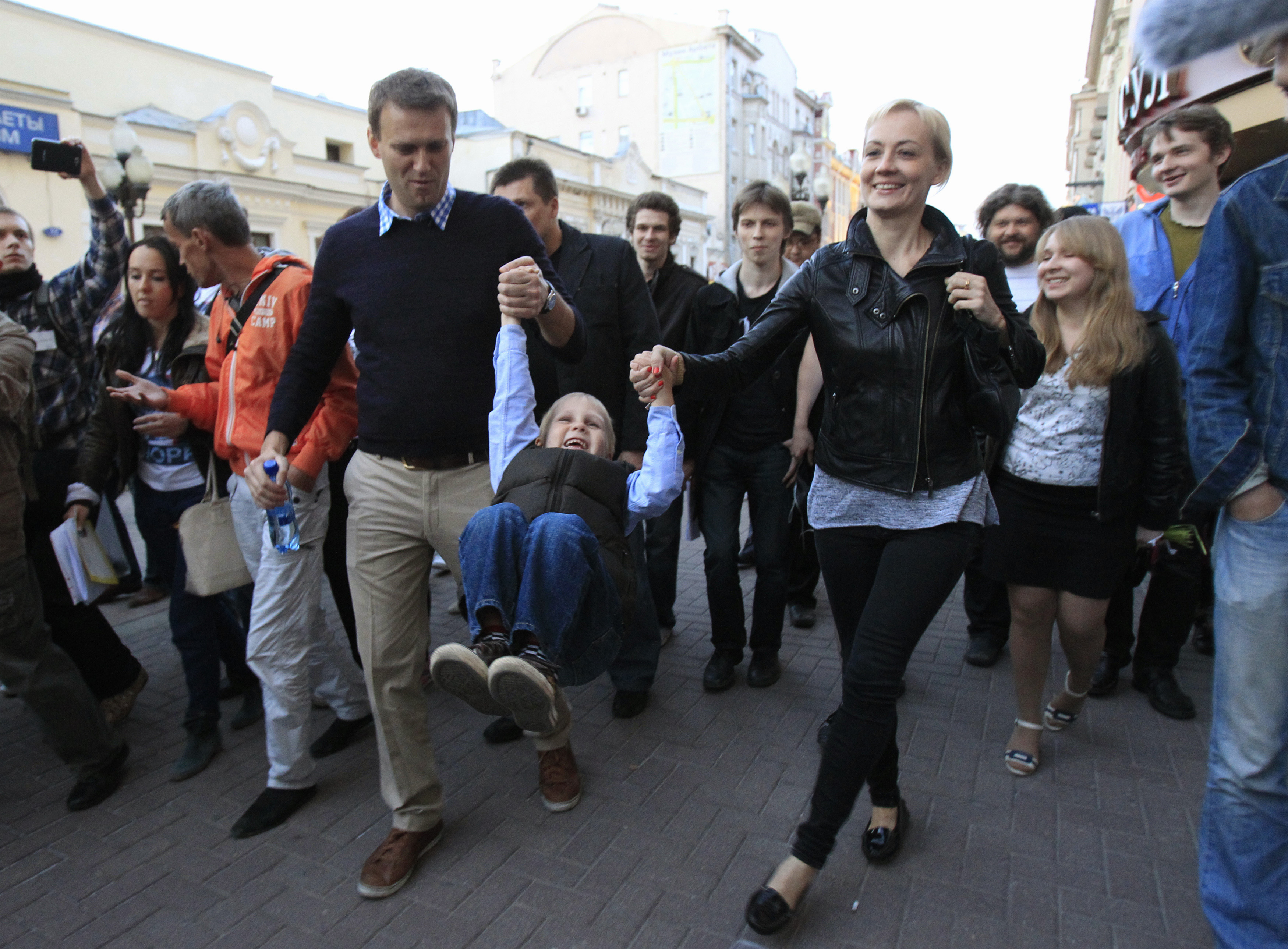 Prominent anti-corruption blogger and opposition leader Navalny walks in central Moscow