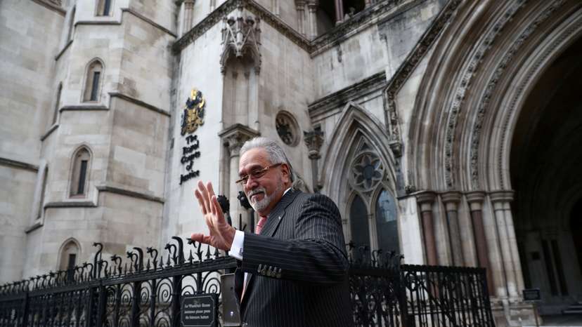 Indian businessman Vijay Mallya leaves the Royal Courts of Justice in London