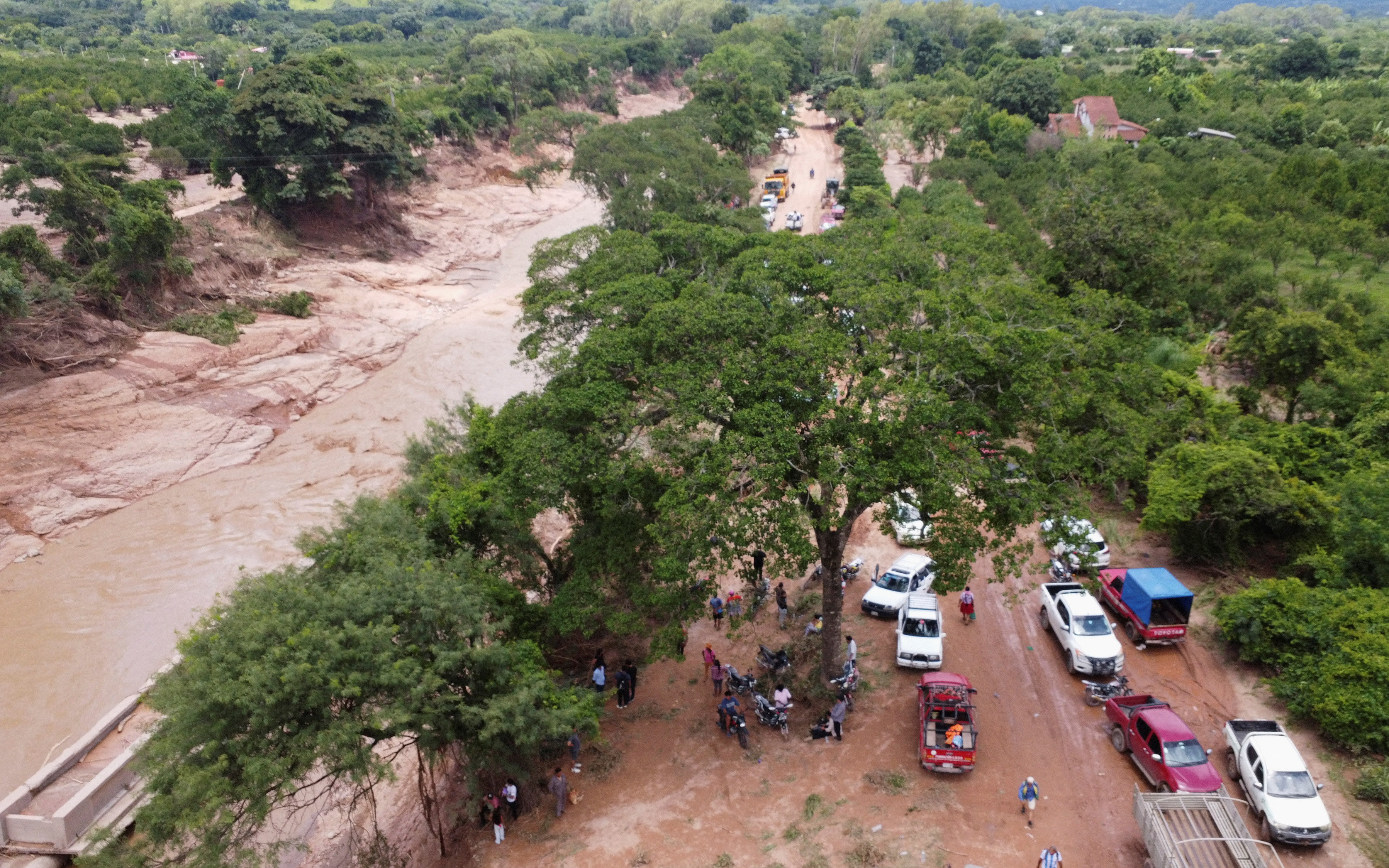 A drone view shows flooded areas that left communities isolated after torrential rain in the community of El Torno