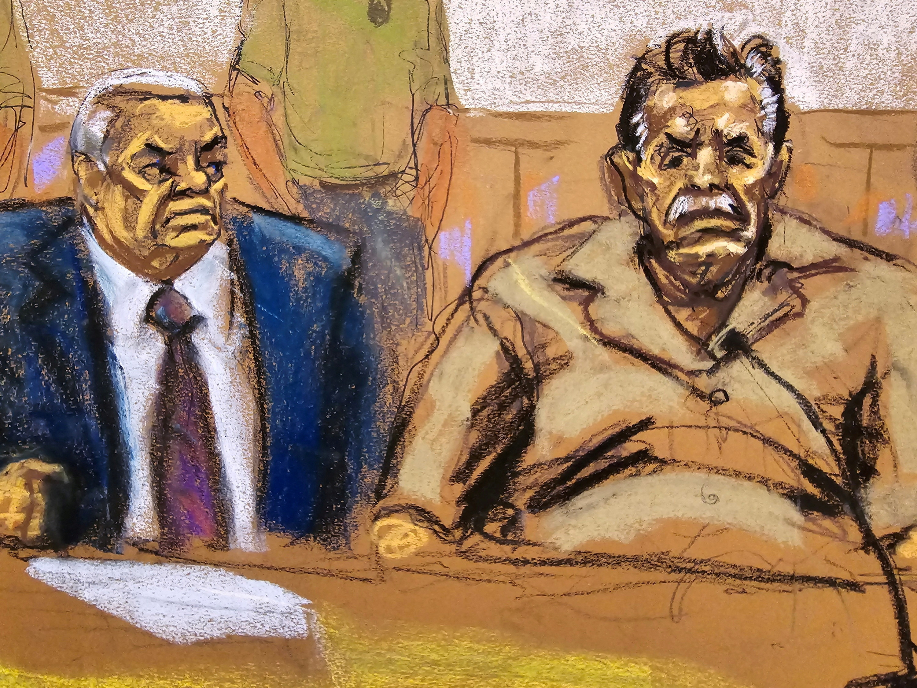 Accused Mexican former drug lord Ismael "El Mayo" Zambada sits with his attorney Frank Perez, at the courthouse in Brooklyn, New York