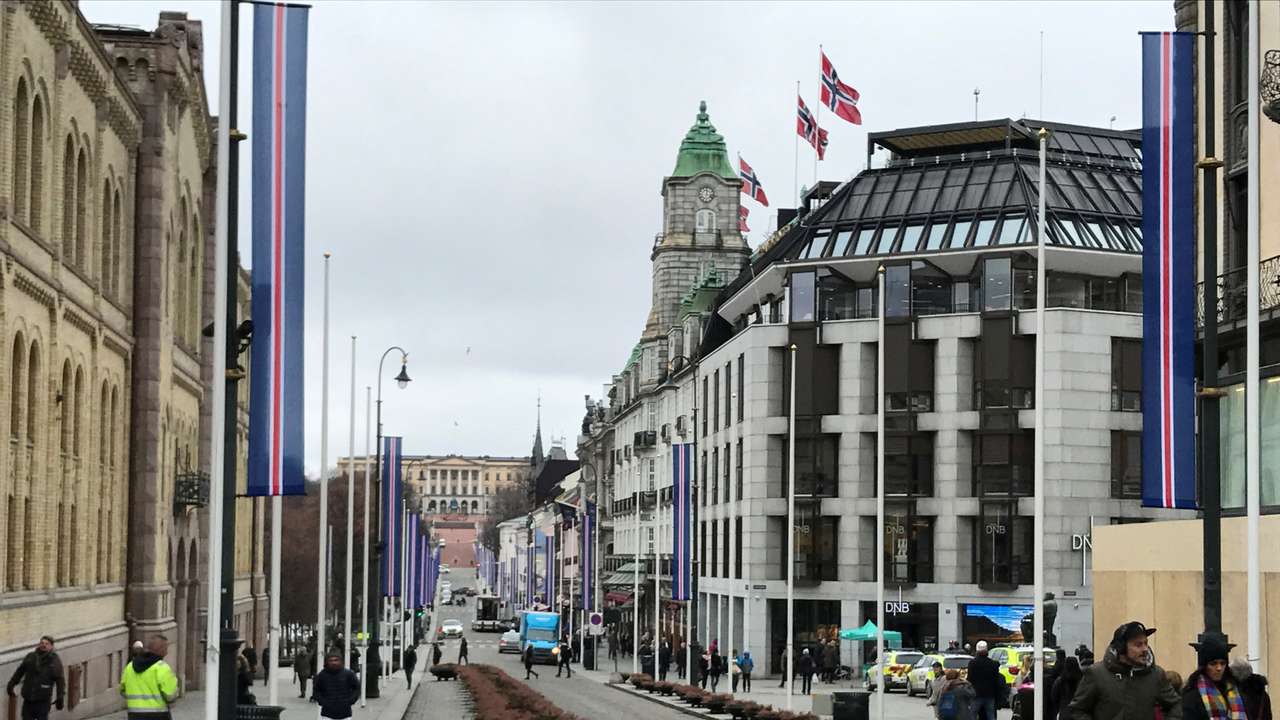 People walk on the street in Oslo