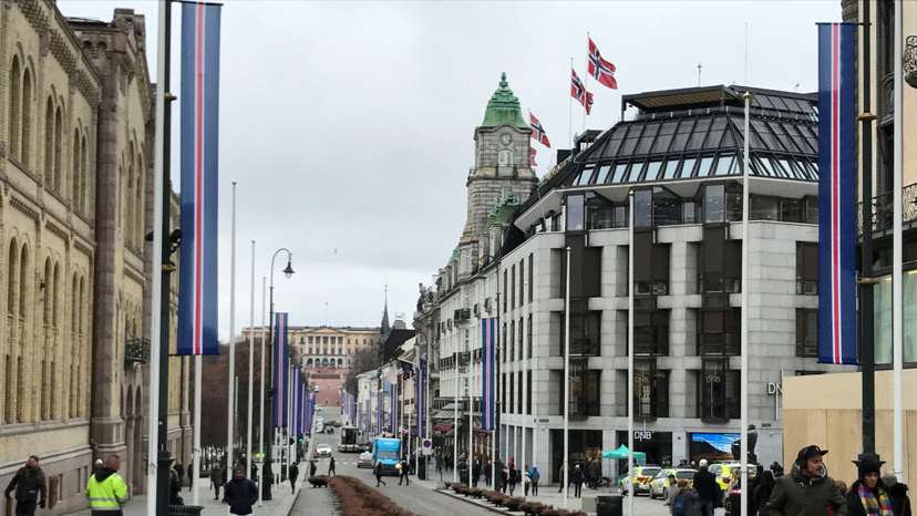 People walk on the street in Oslo