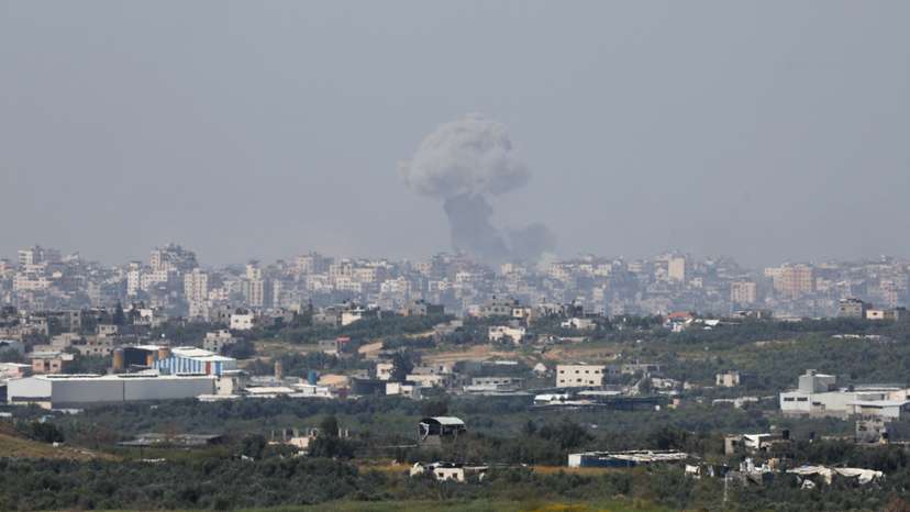 Smoke rises over Gaza following an explosion, as seen from Israel