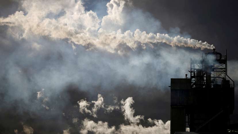 FILE PHOTO: Emissions from the chimneys of Yara France plant in Montoir-de-Bretagne near Saint-Nazaire