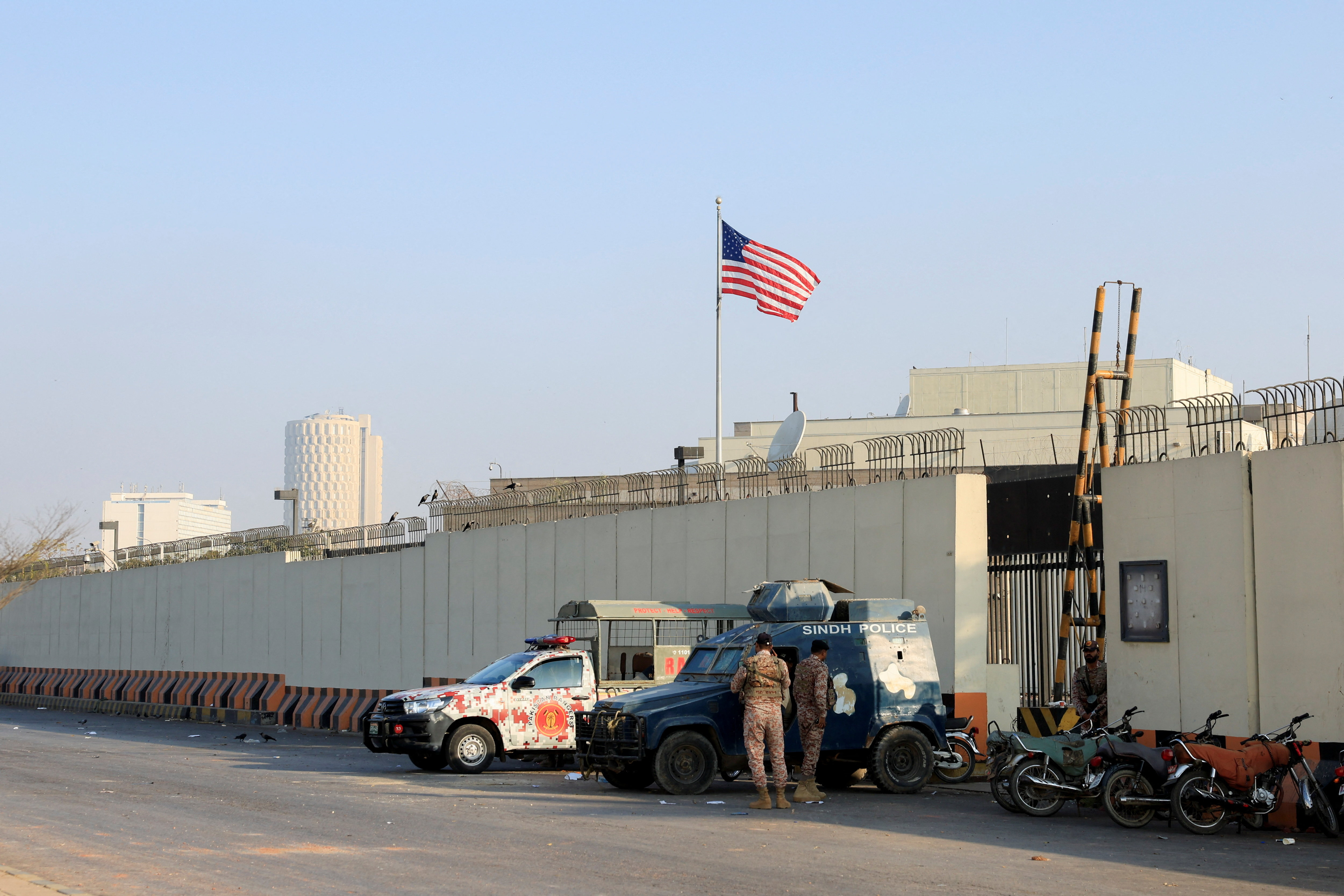 Police and Paramilitary vehicles stand outside U.S. Consulate General, in Karachi