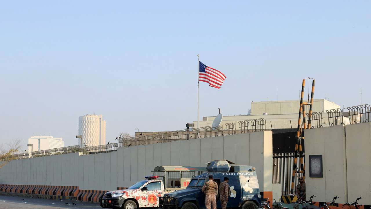 Police and Paramilitary vehicles stand outside U.S. Consulate General, in Karachi