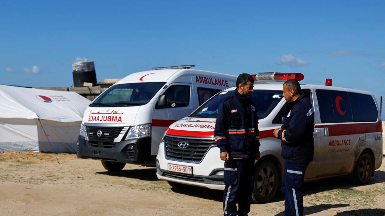 Medics help Palestinians, at a medical point formed to get better access to frontlines, in Khan Younis in the southern Gaza Strip