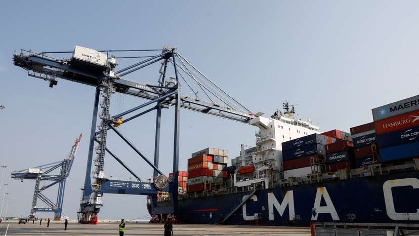 FILE PHOTO: A view shows cranes and a container ship at the newly-commissioned Lekki Deep Sea Port in Lagos