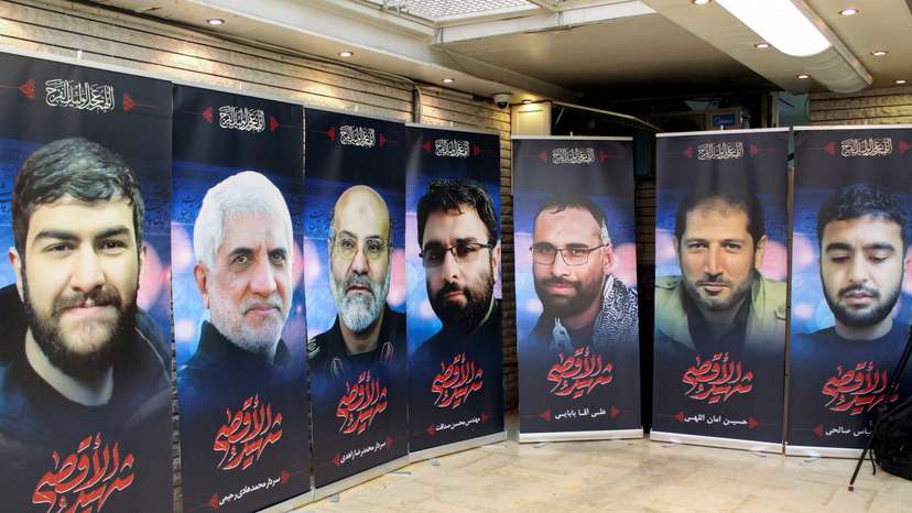 Posters depicting Iranians who were killed in a suspected Israeli airstrike, are displayed at the Iranian embassy in Damascus