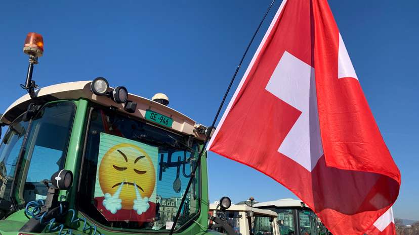 Swiss farmers and their tractors are seen during a protest in Geneva