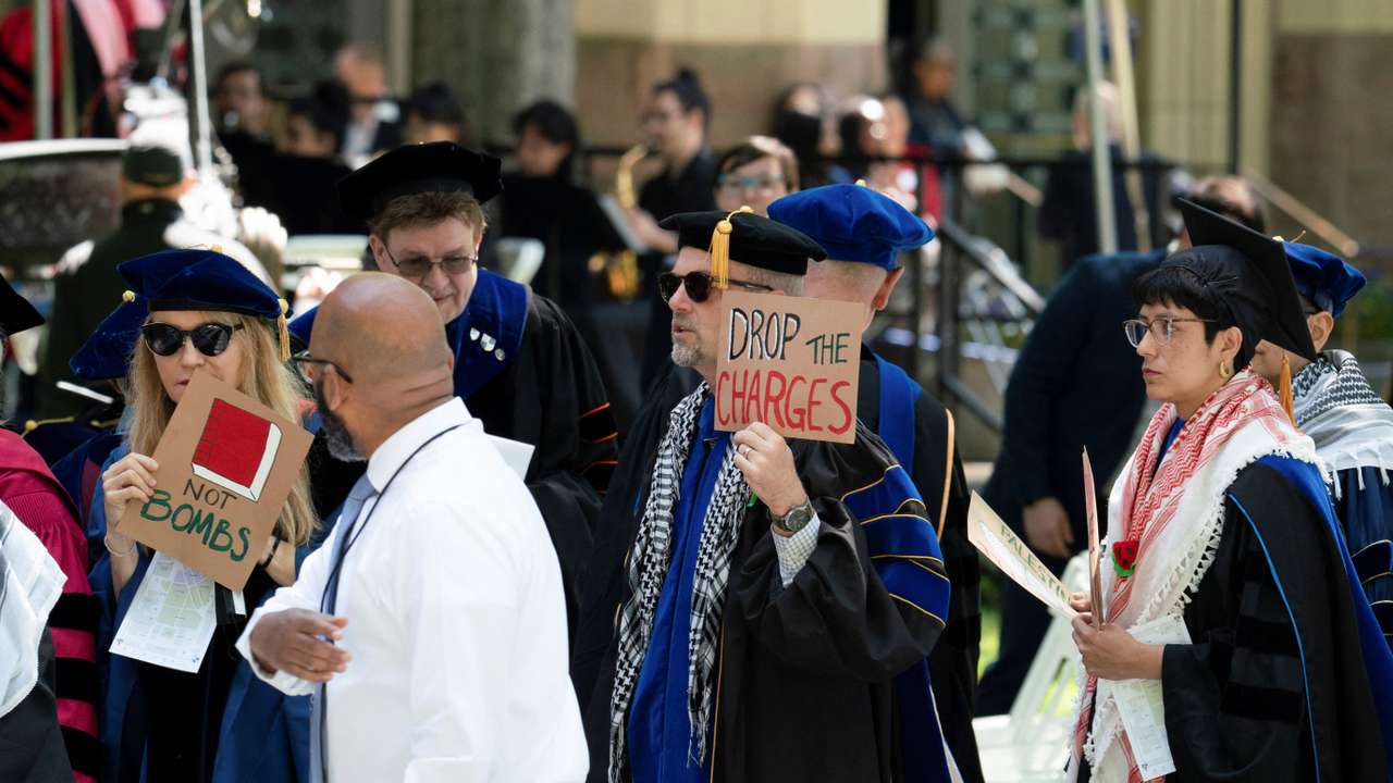 Faculty and administrators protest the conflict between Israel and the Palestinian Islamist group Hamas, during the commencement at Yale University