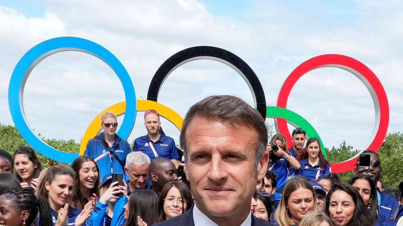 FILE PHOTO: French President Emmanuel Macron visits the Olympic village in Paris