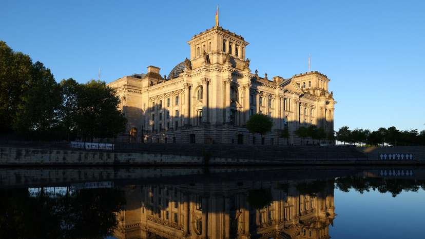 Sunlight illuminates the Reichstag building, the seat of the German parliament, in Berlin