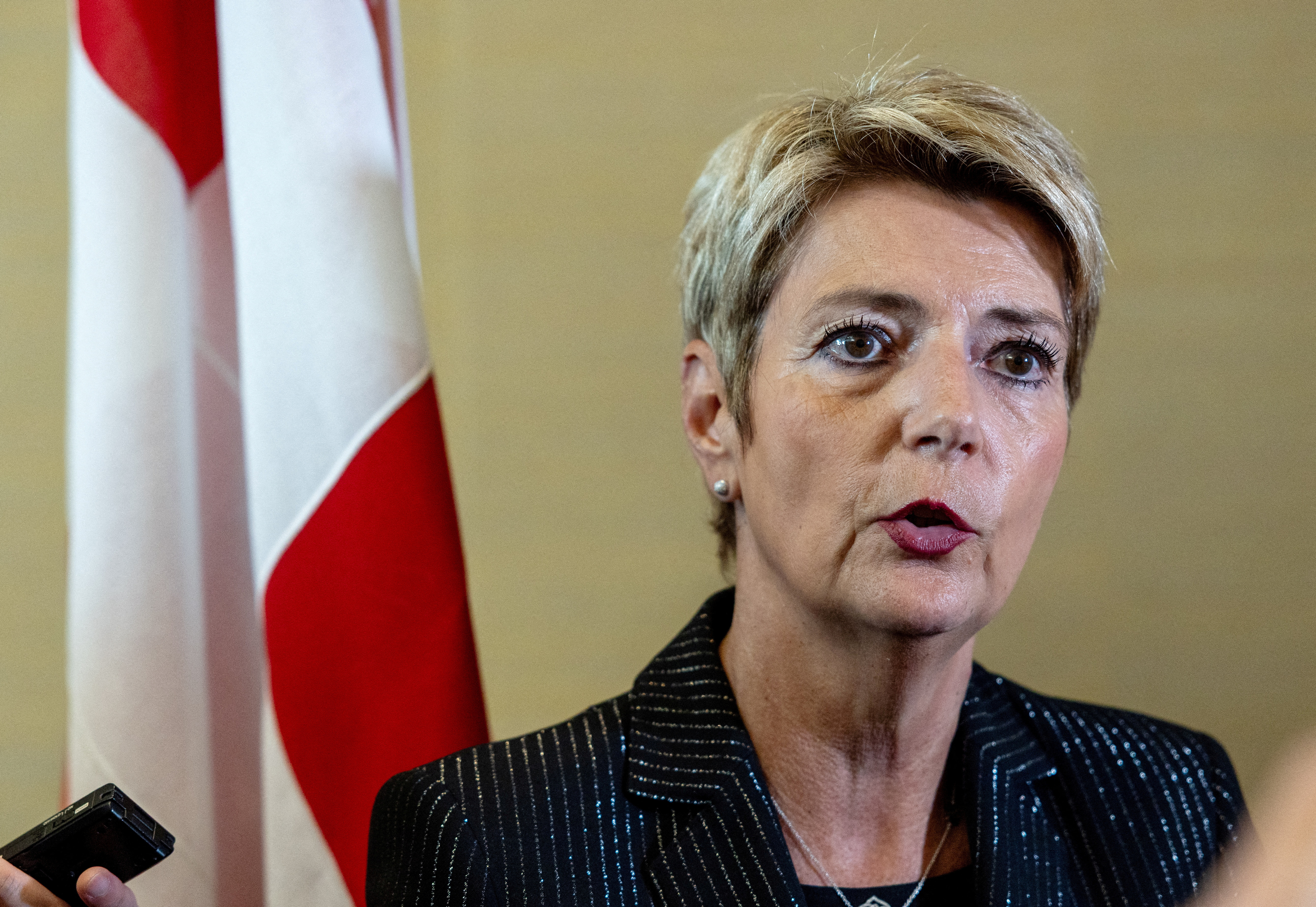 FILE PHOTO: Swiss President Keller-Sutter talks to the media after a news conference in Geneva