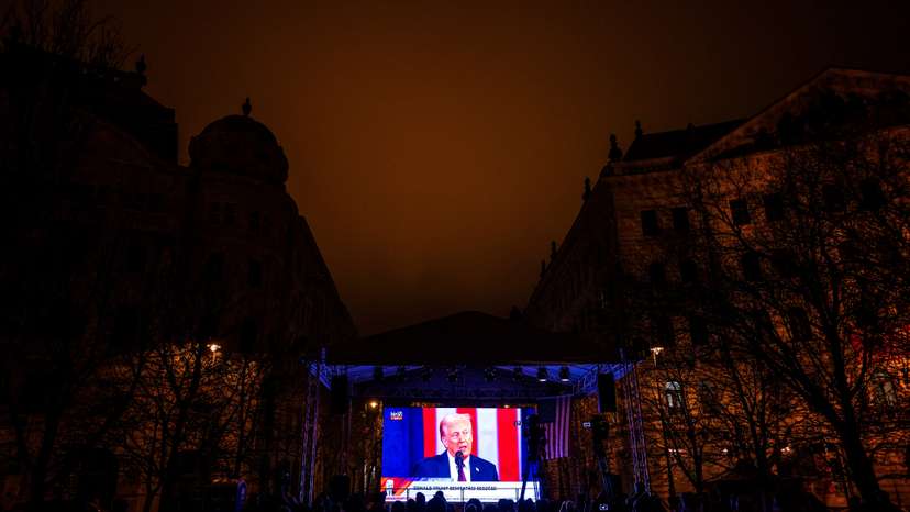 Hungarian fans of incoming U.S. President Donald Trump celebrate his return to the White House