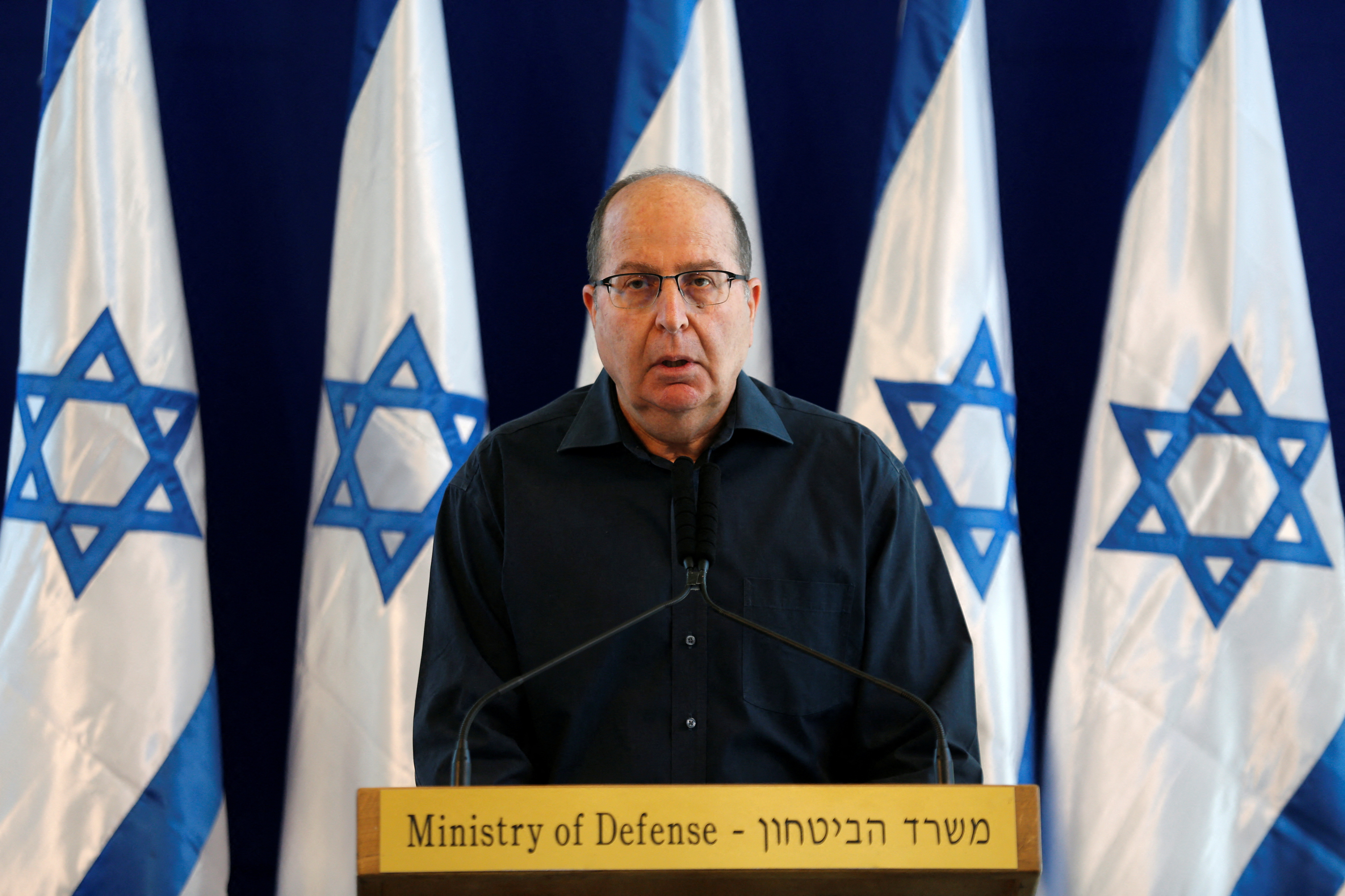 FILE PHOTO: Israel's Defence Minister Yaalon gives a statement to the press at the Kirya Army base in Tel Aviv, Israel