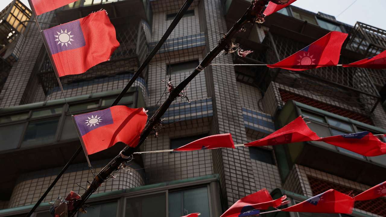 Taiwan flags hang above the streets in Taoyuan