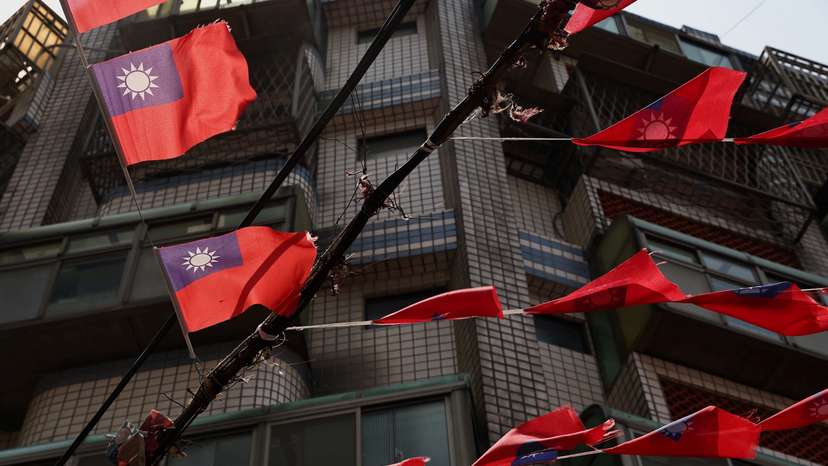 Taiwan flags hang above the streets in Taoyuan