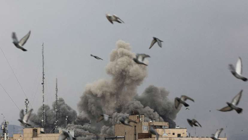 FILE PHOTO: Smoke rises following an explosion, after Israel and the U.S. launched strikes on Iran, in Tehran