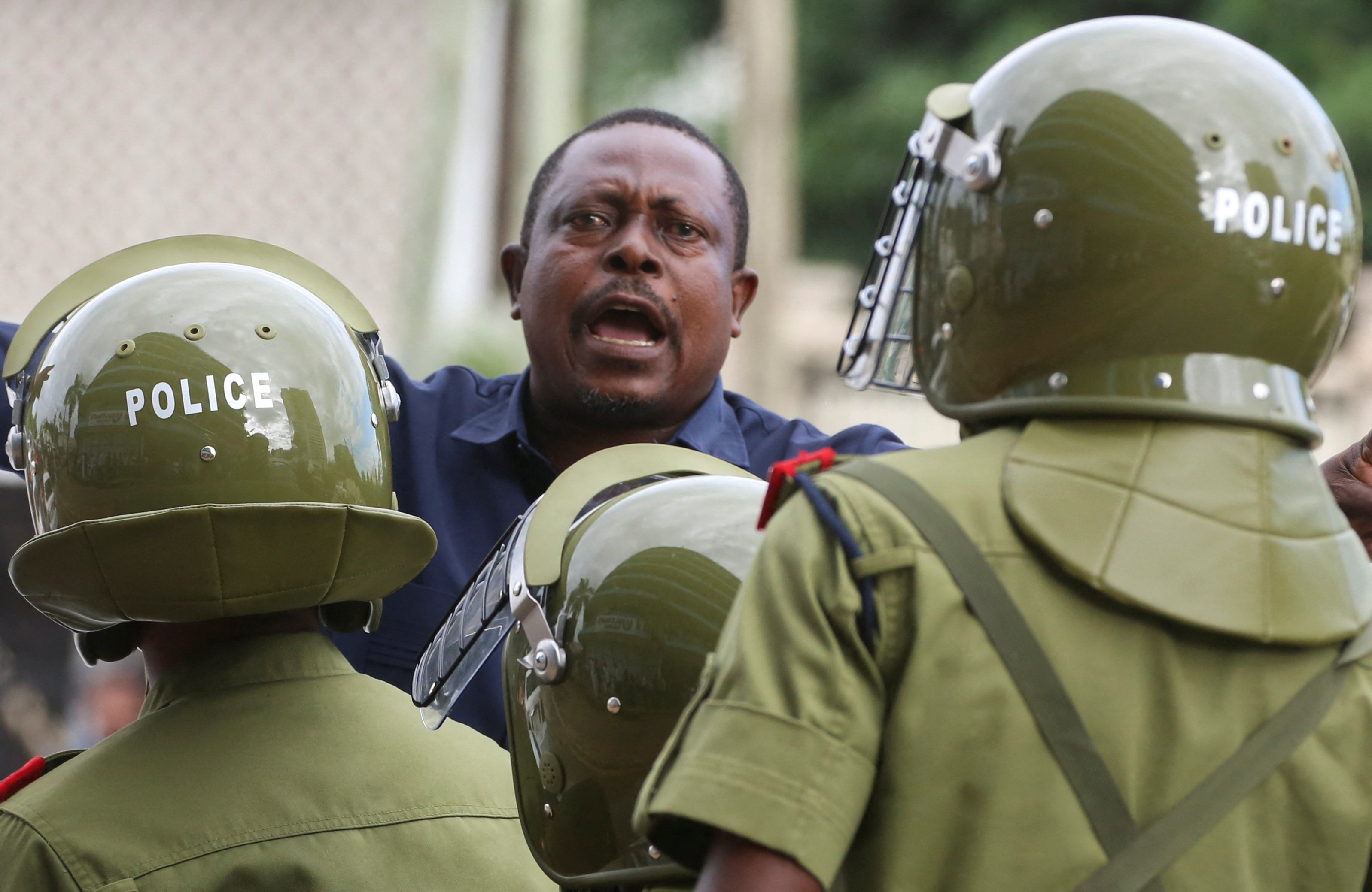 Tanzania police detain opposition officials on way to court, in Dar es Salaam