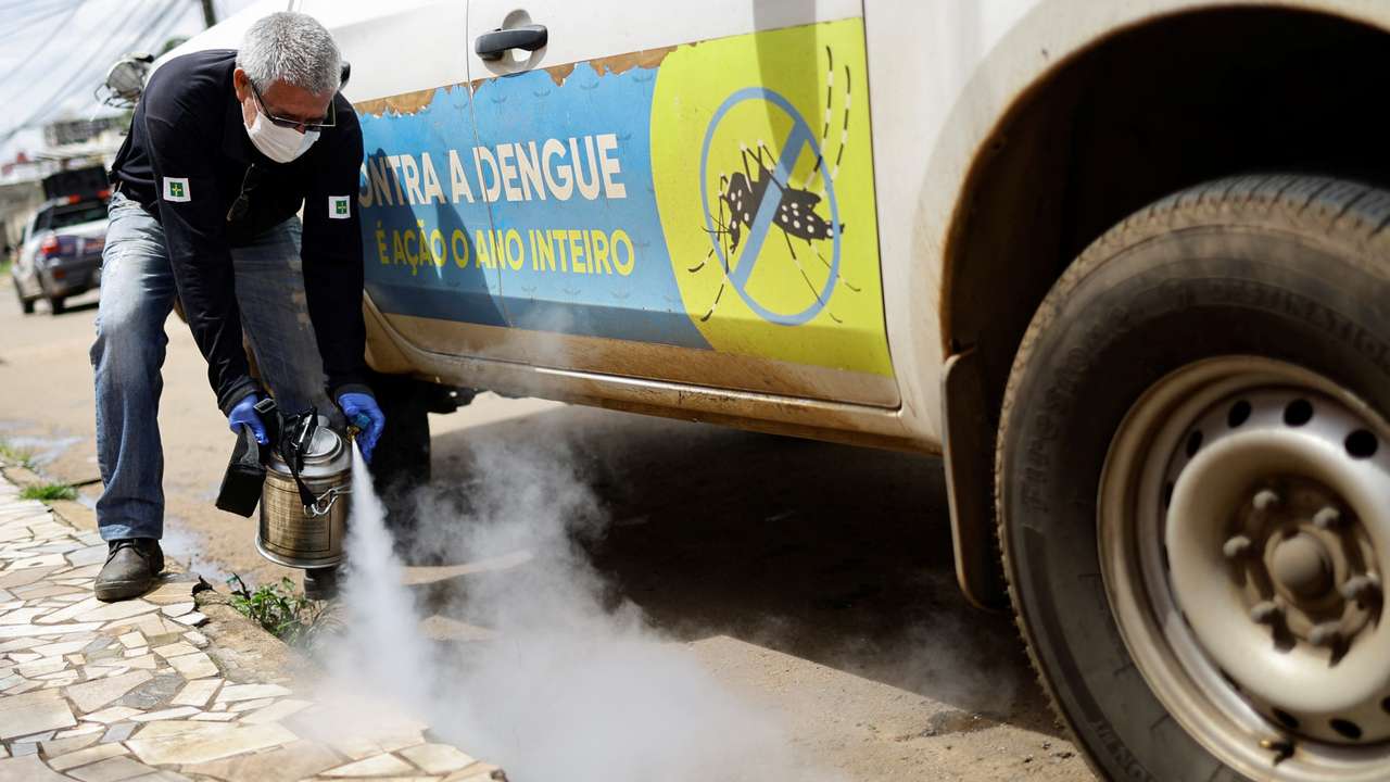 Health workers prevent the spread of mosquito during dengue outbreak in Brasilia