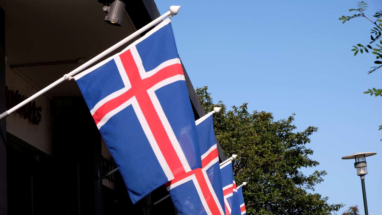 Iceland's national flags flutter over the souvenir shop in Reykjavik