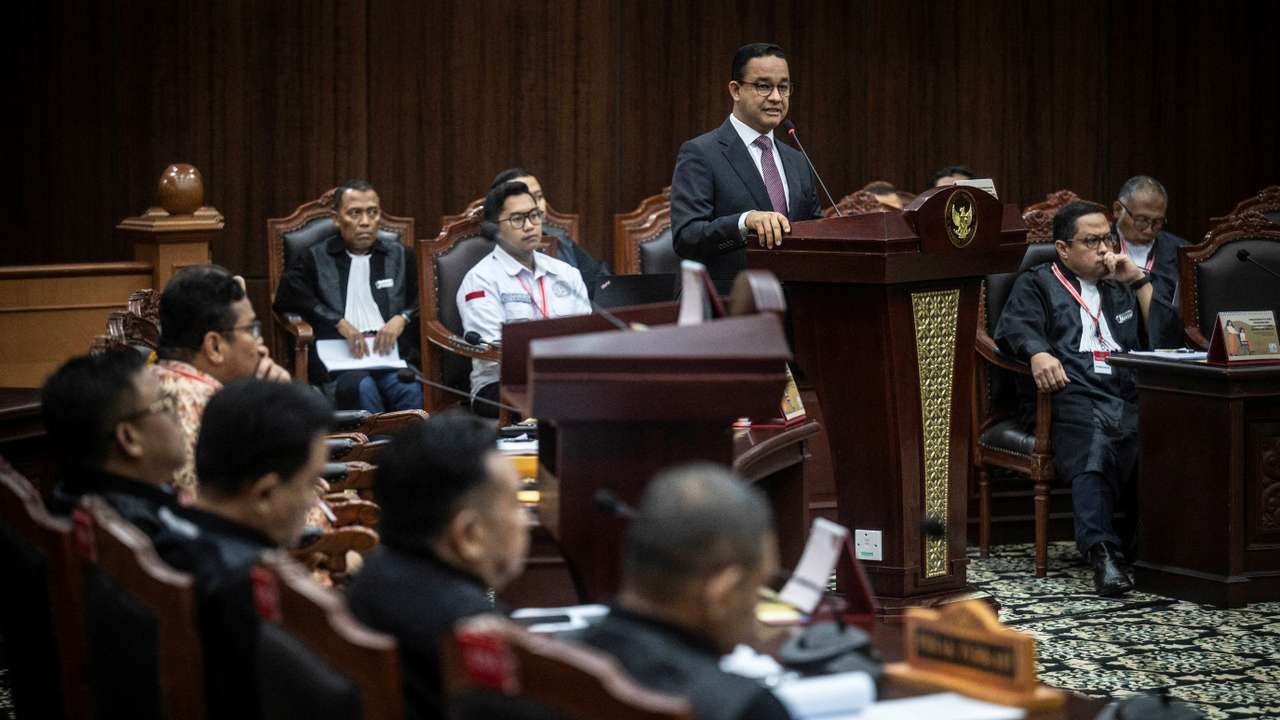 Presidential candidate Anies Baswedan speaks while challenging the election result at Indonesia's constitutional court in Jakarta