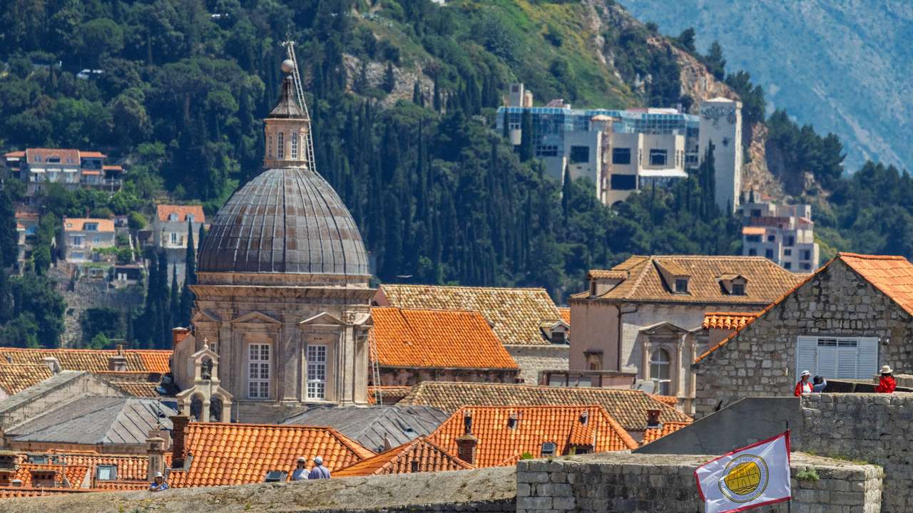 Tourists walk at the Dubrovnik walls