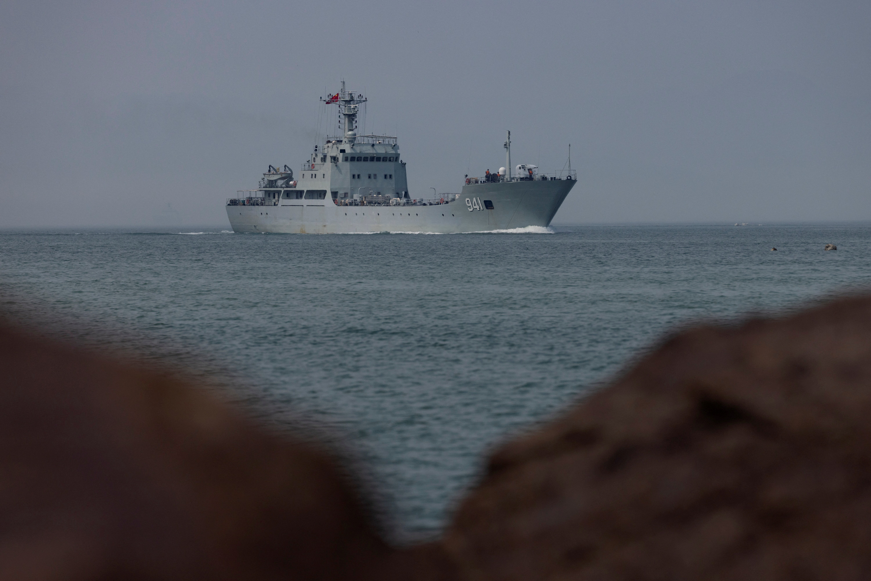 FILE PHOTO: A Chinese warship takes part in a military drill off the Chinese coast near Fuzhou, Fujian Province