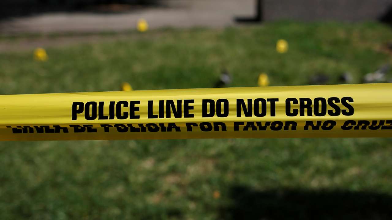 Police tape is seen at Rosa Parks Plaza near the shooting scene in Dallas, Texas