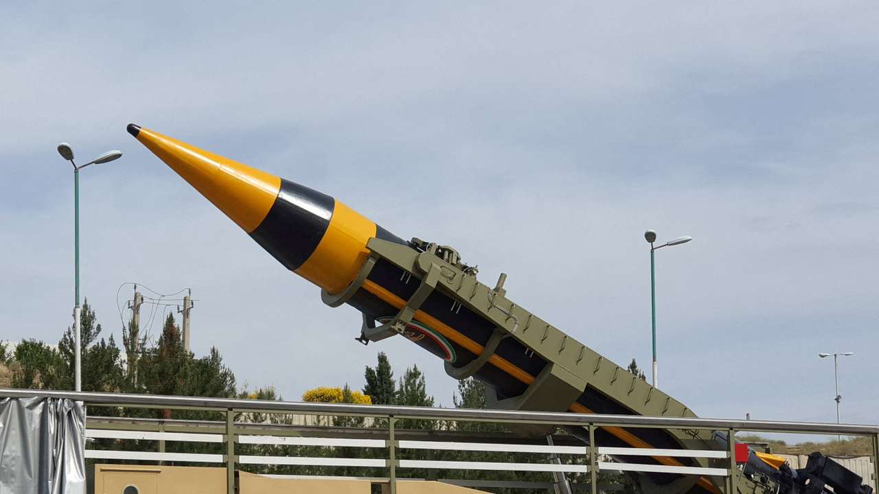 Iran unveils 2,000 km ballistic missile