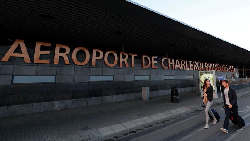 Passengers arrive at Brussels South Charleroi Airport during a Ryanair wider European strike