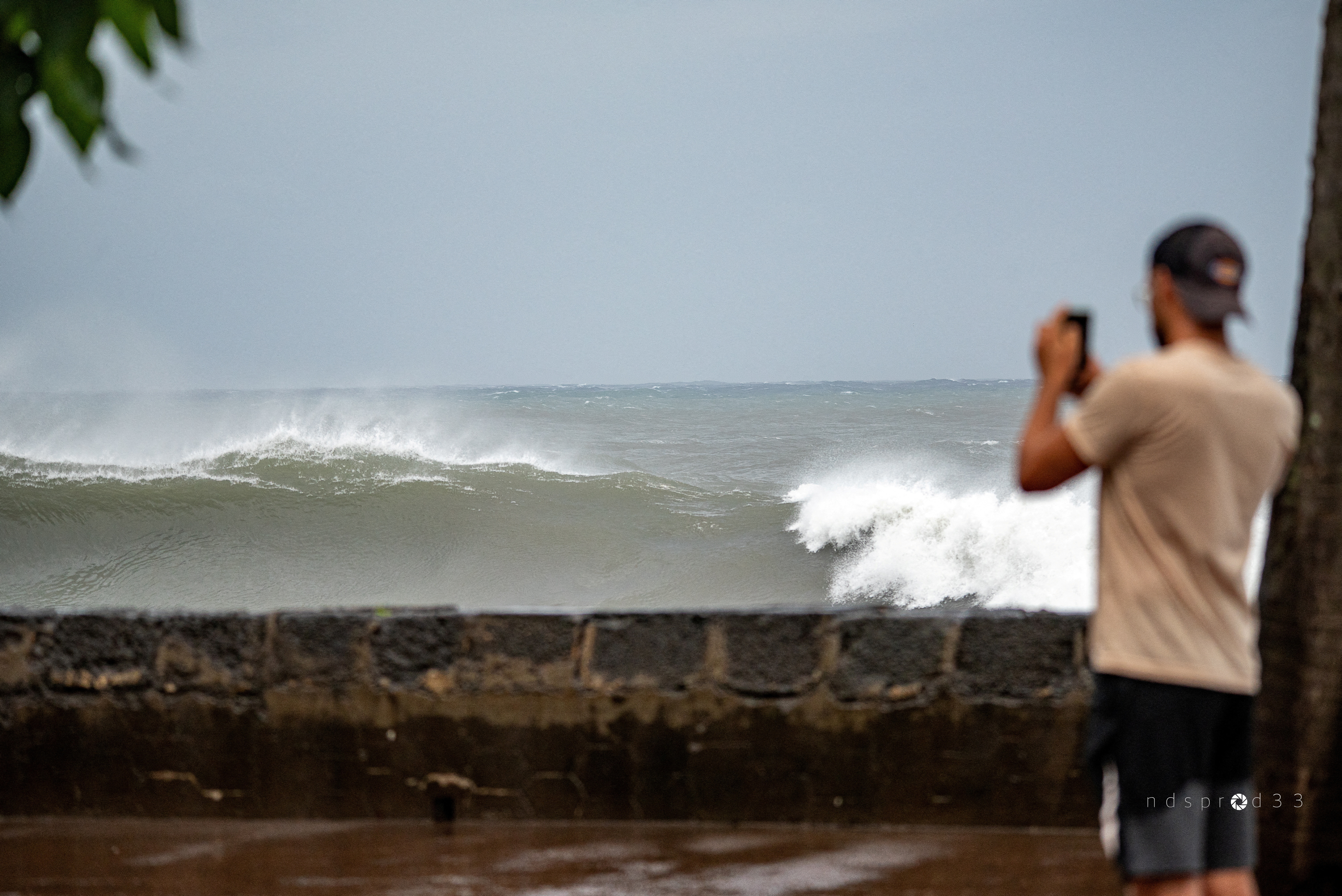 FILE PHOTO: Waves approach the shore amid Cyclone Belal, in Saint-Denis on Reunion Island