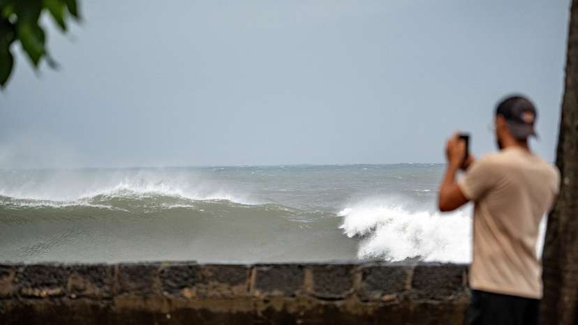 FILE PHOTO: Waves approach the shore amid Cyclone Belal, in Saint-Denis on Reunion Island