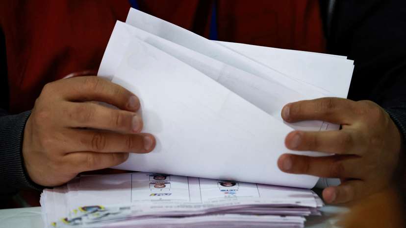 Electoral delegates perform a standard audit of votes after presidential election, in Quito