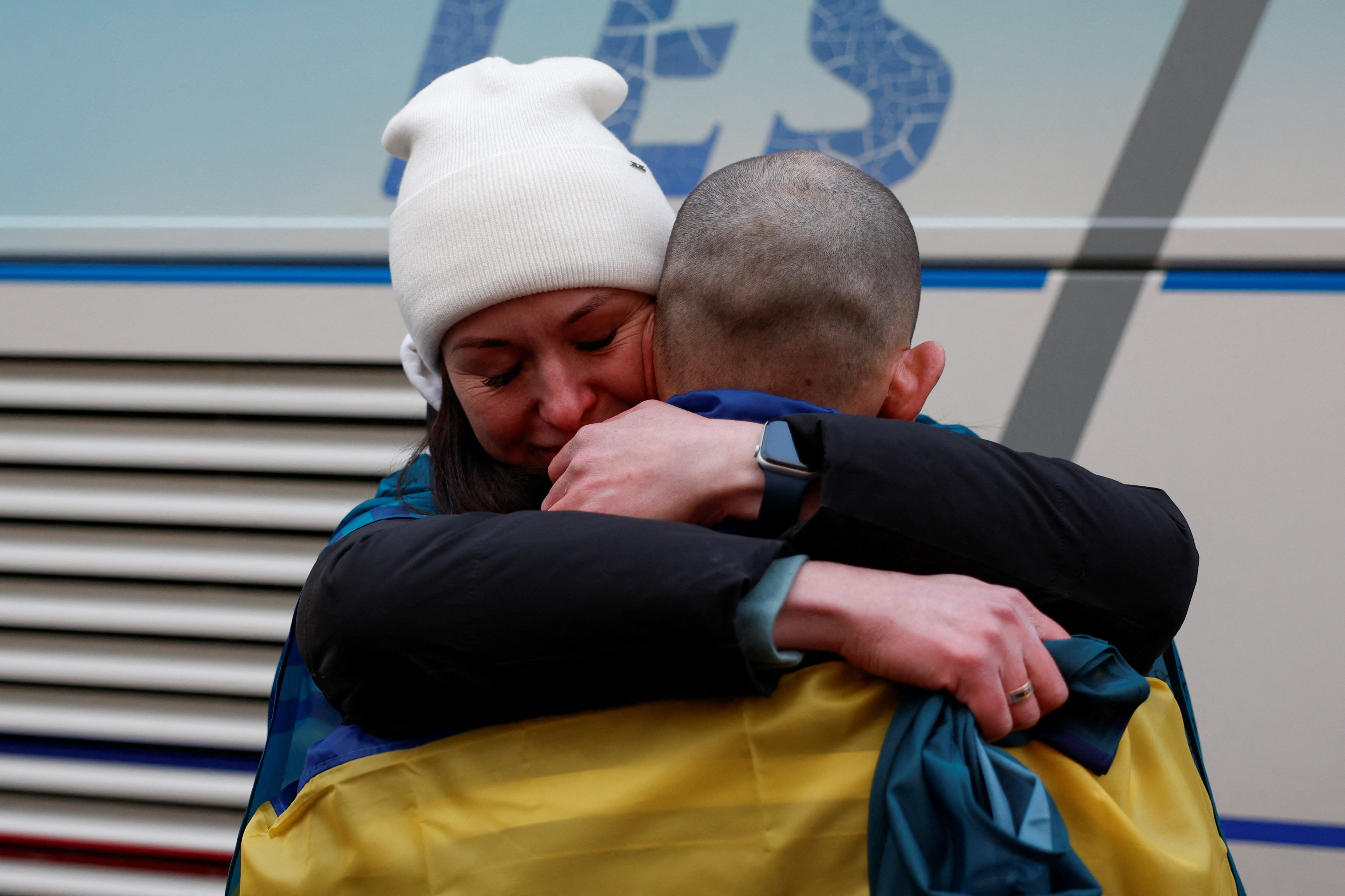 Ukrainian prisoners of war (POWs) return after a swap in an undisclosed location in Ukraine