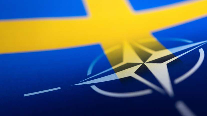 Illustration shows Swedish and NATO flags