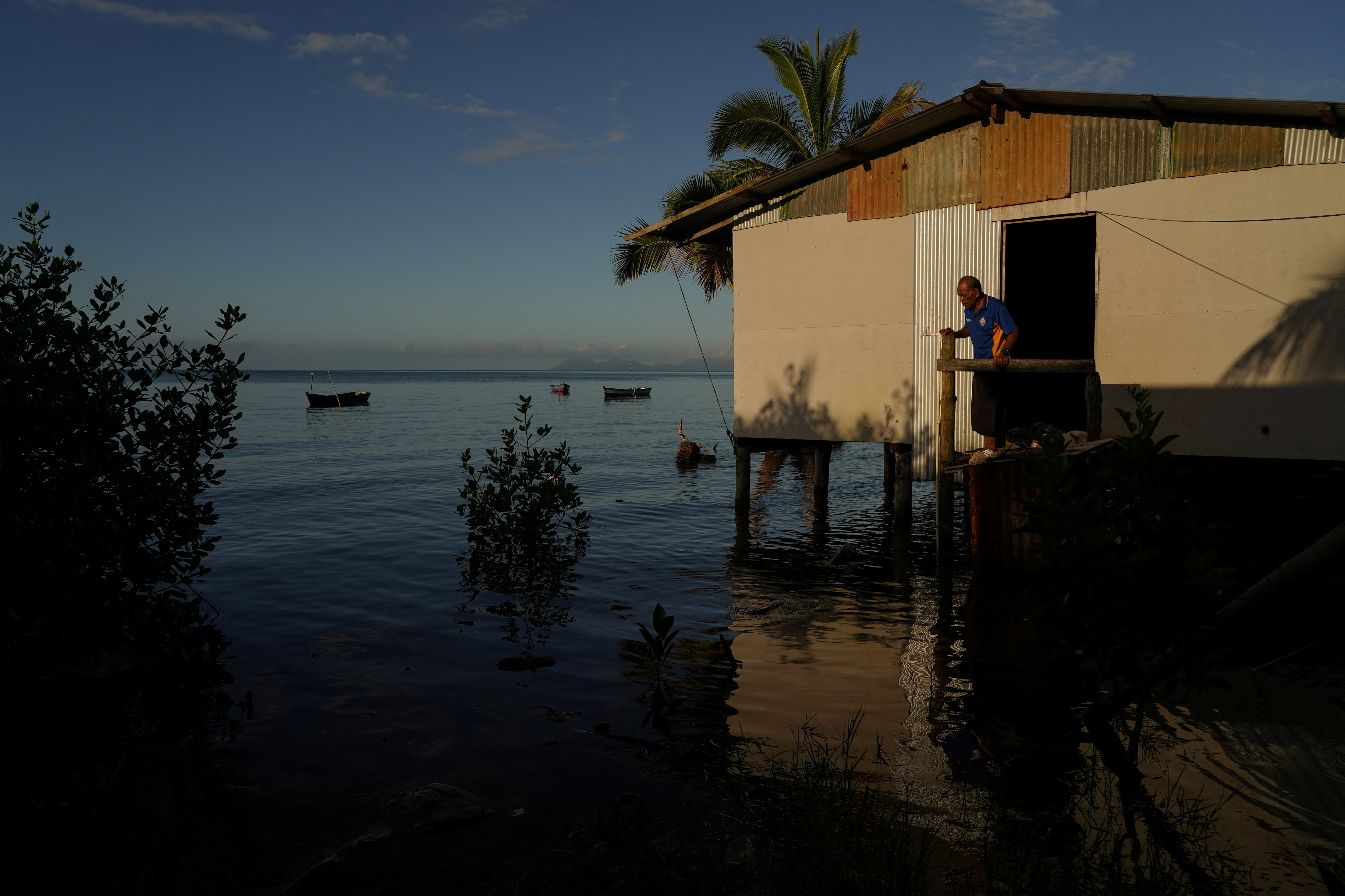 FILE PHOTO: Rising sea levels are forcing Fiji's villagers to relocate