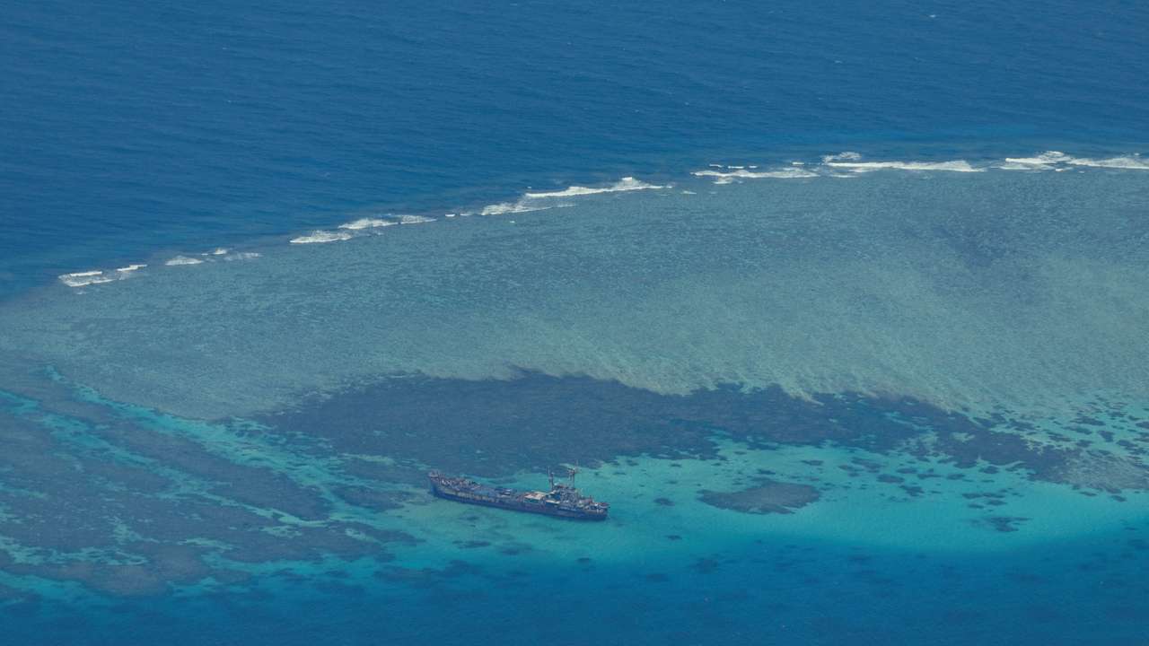 FILE PHOTO: Philippine Coast Guard flyby over the South China Sea